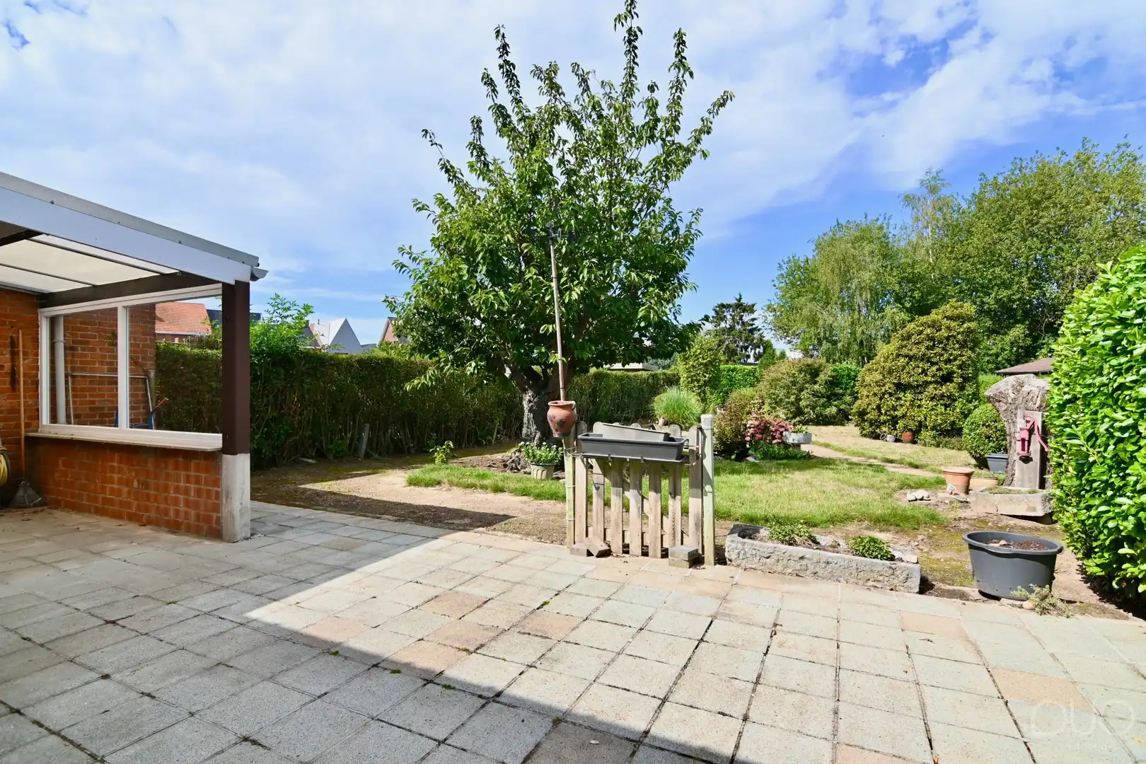Ruime halfopen gezinswoning met prachtige westgerichte tuin foto 18