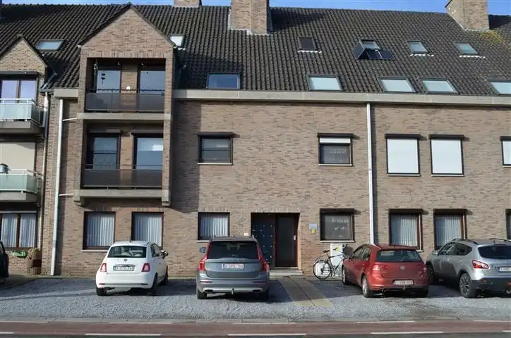 Ruim appartement met twee slpk's, terras en garage in centrum Beverlo foto 2