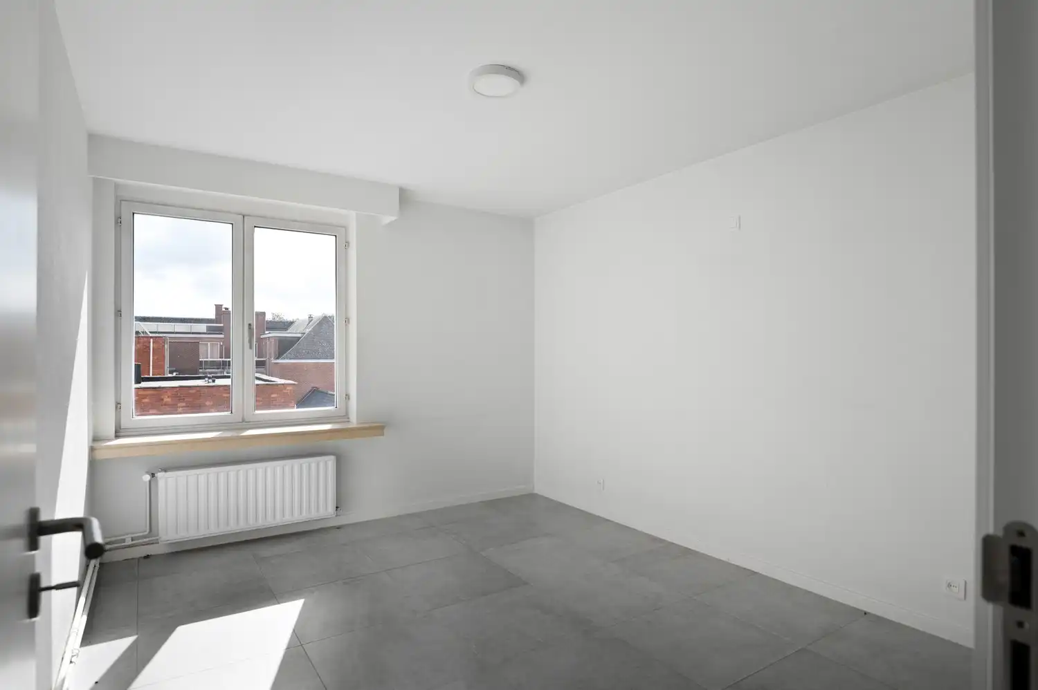 Lichtrijk, instapklaar dakappartement met 2 slaapkamers nabij het Zimmerplein in Lier! foto 10