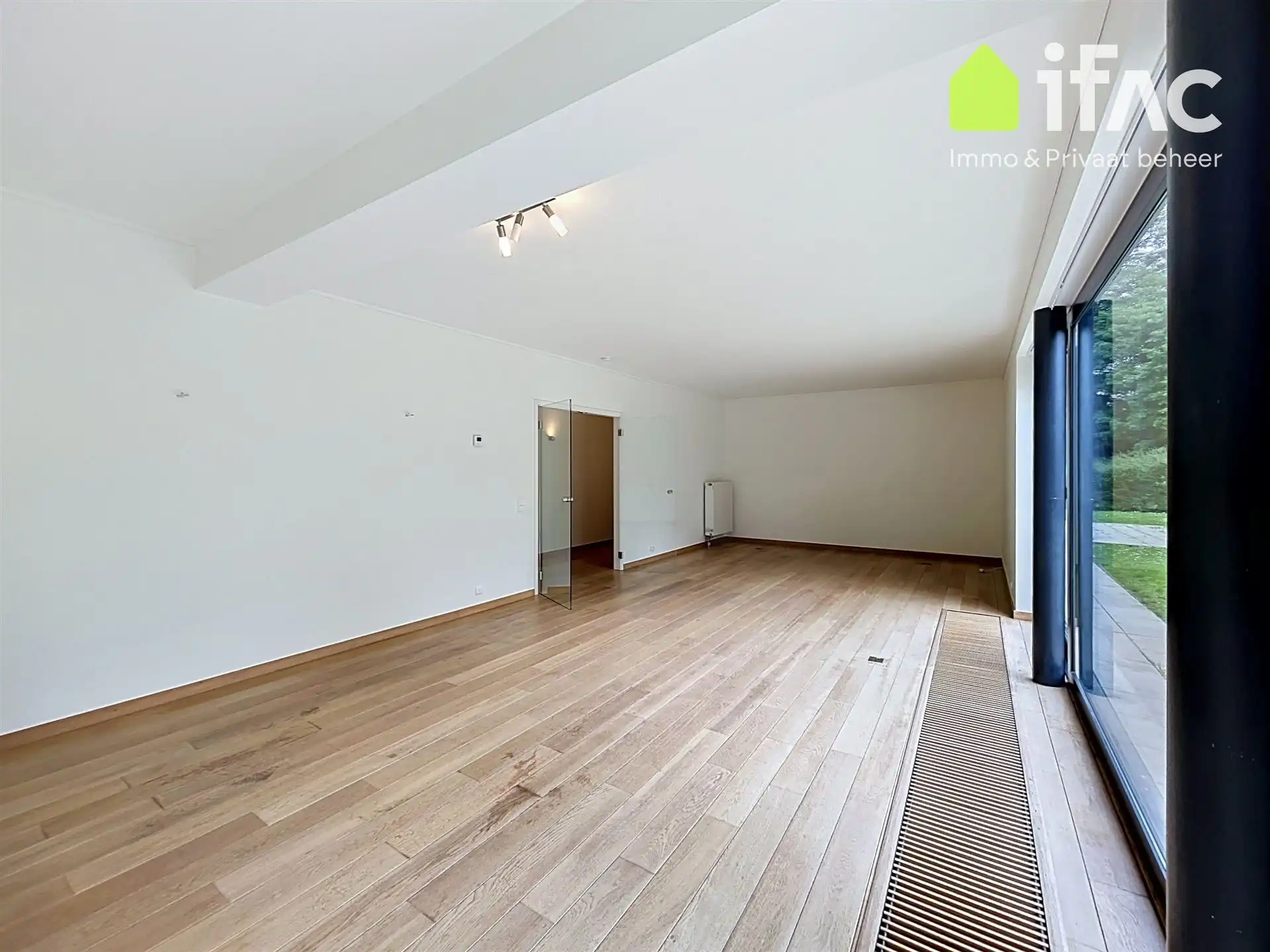 Exclusief gelijkvloers appartement met 2sk en privé tuin foto 7