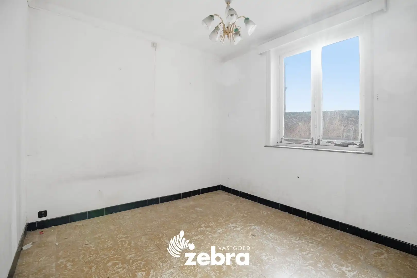 Te renoveren appartement op centrale ligging in Kortrijk! foto 12