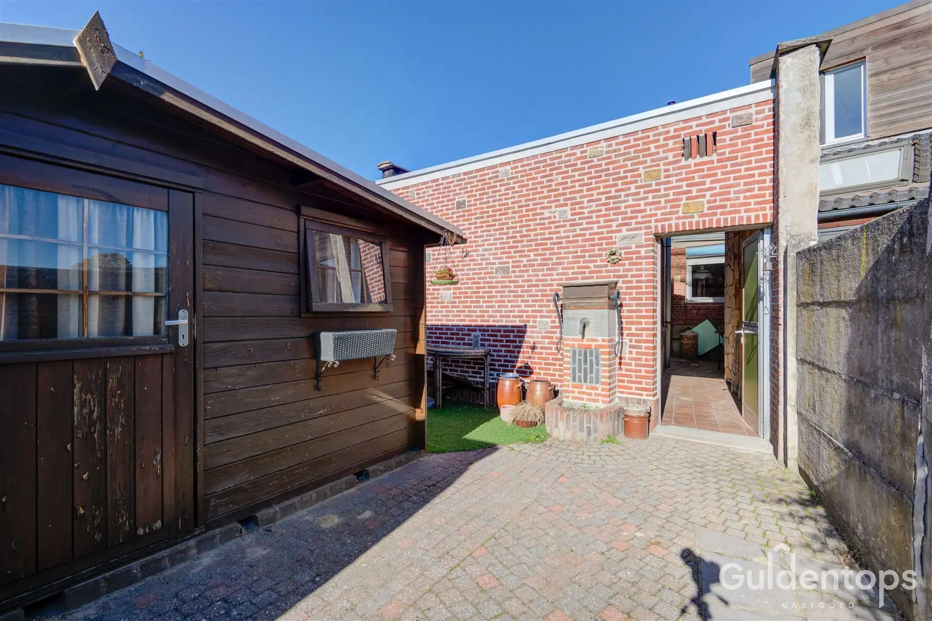 Zeer goed gelegen rijwoning foto 35