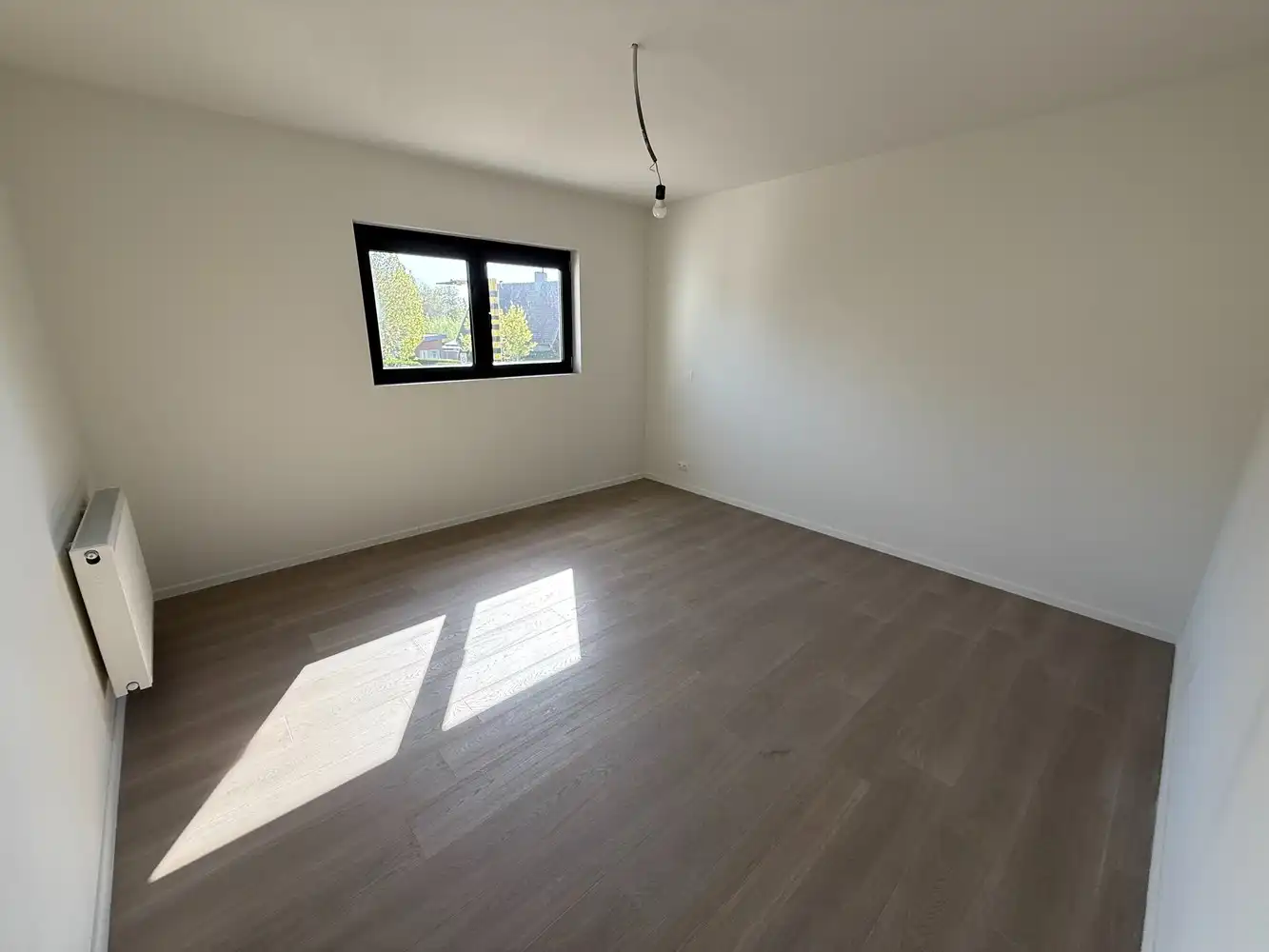 Ruim nieuwbouwappartement met 2 slaapkamers én parkeerplaats! foto 7