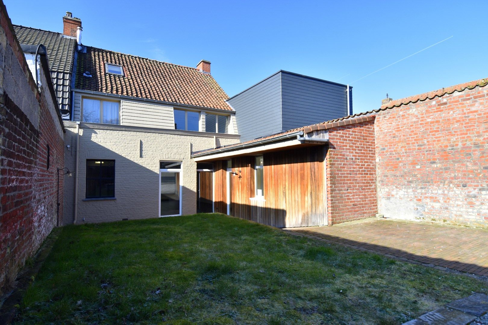 Energiezuinige (label B!) gezinswoning met praktijkruimte, 3 slaapkamers en tuin te koop in hartje Bellegem foto 11