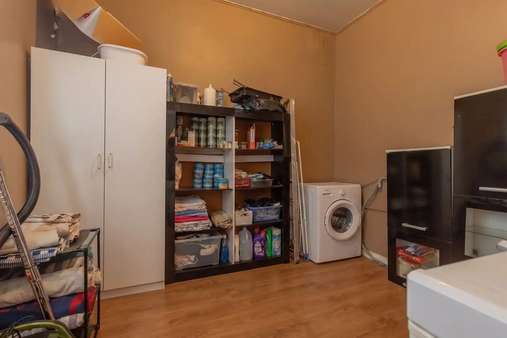 Opbrengsteigendom met handelsruimte en verhuurd duplex appartement in het centrum van Willebroek foto 27