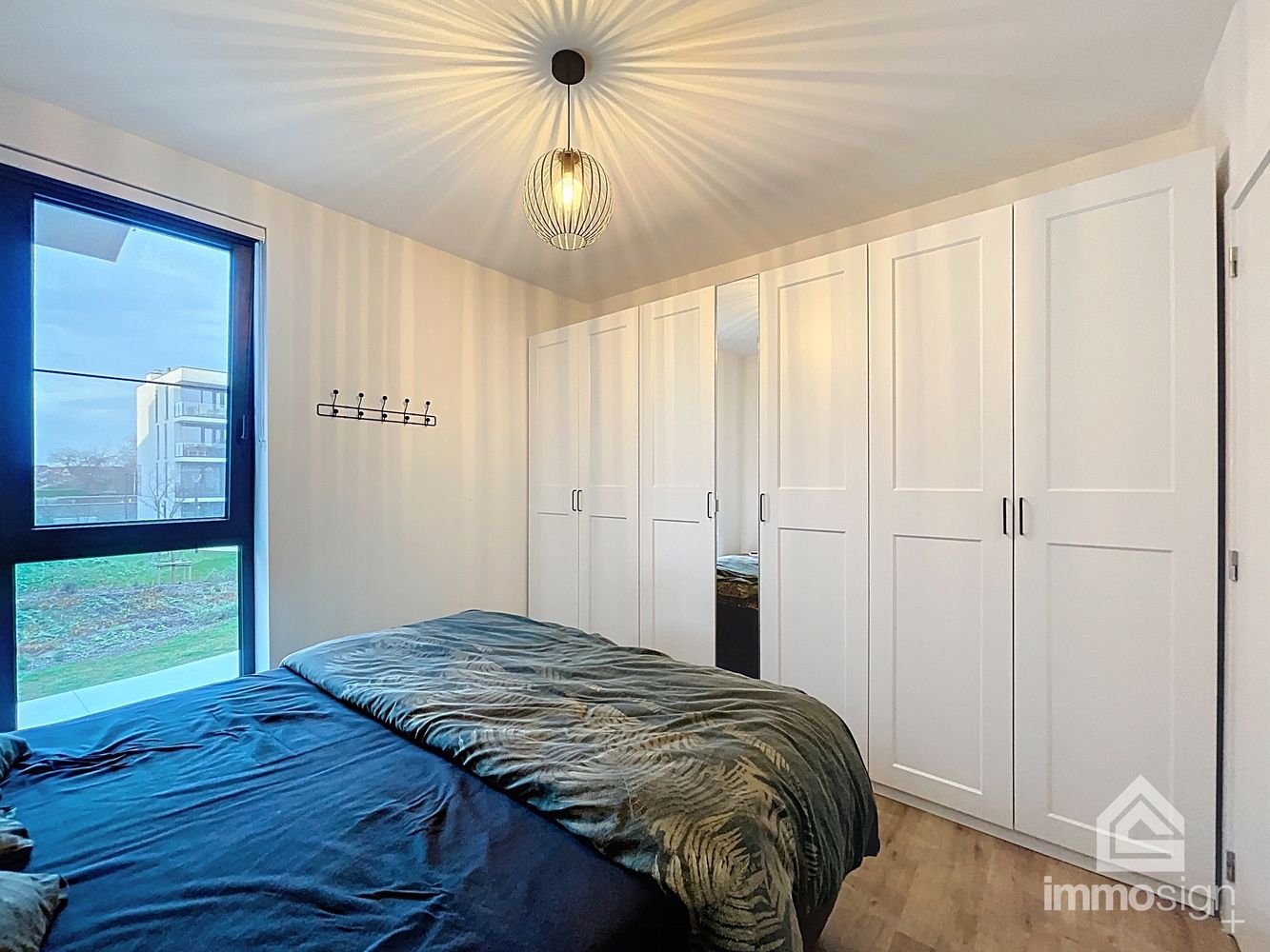 Modern en energiezuinig appartement met 2 slaapkamers en een terras van 15 m² in het geliefde Sint-Michielspark te Bree! foto 14