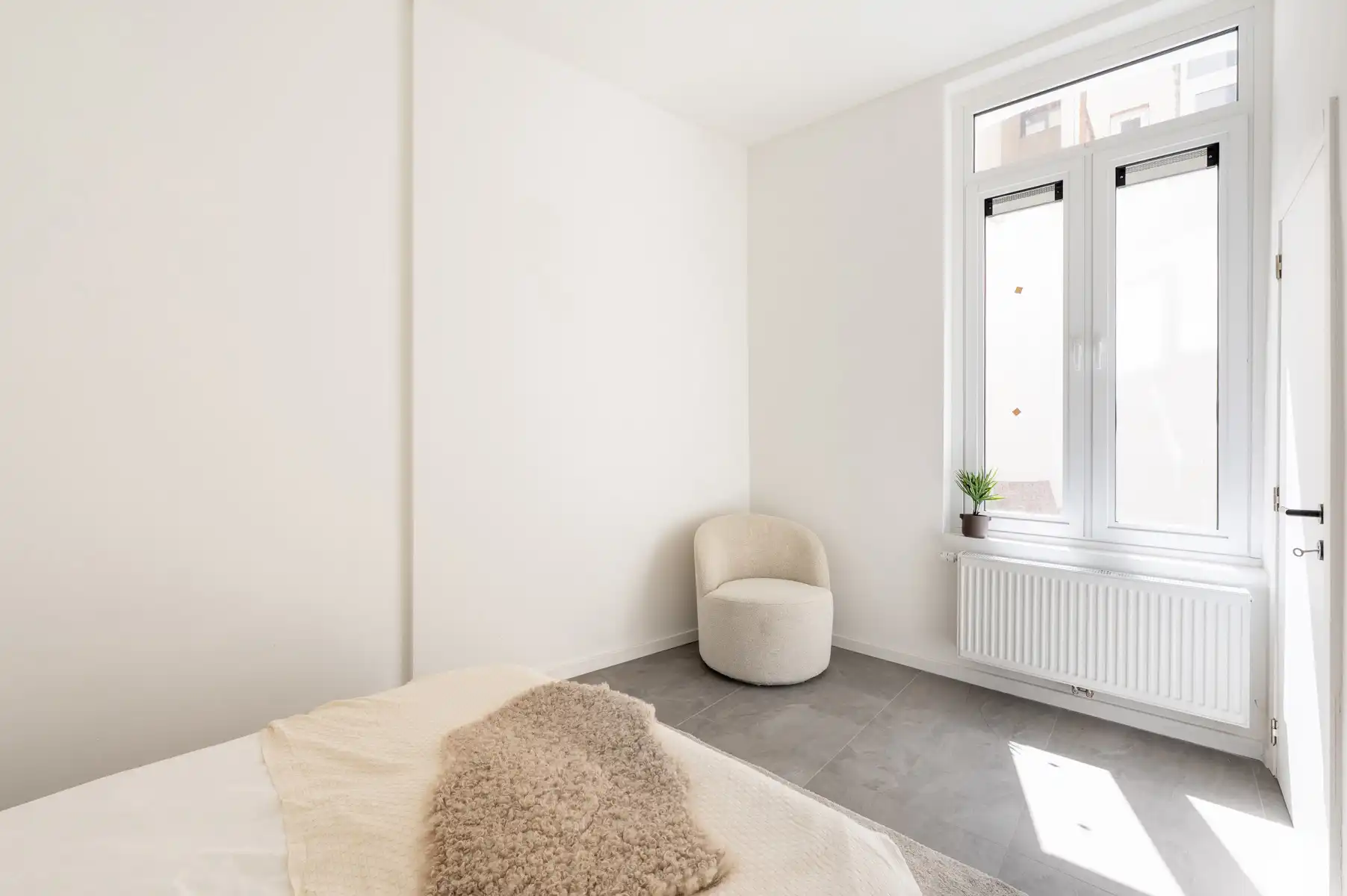 Lichtrijk gelijkvloers appartement op de Sint-Andriesplaats foto 11