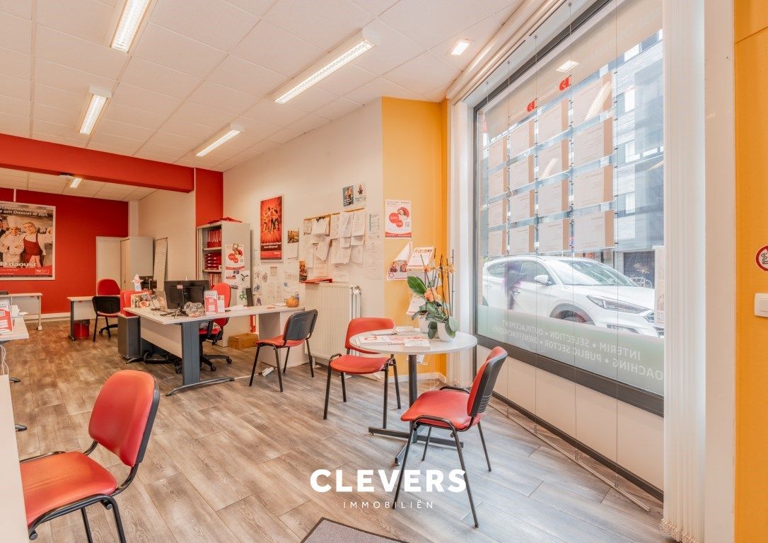Opbrengsteigendom met lopende handelshuur + 2 appartementen foto 5