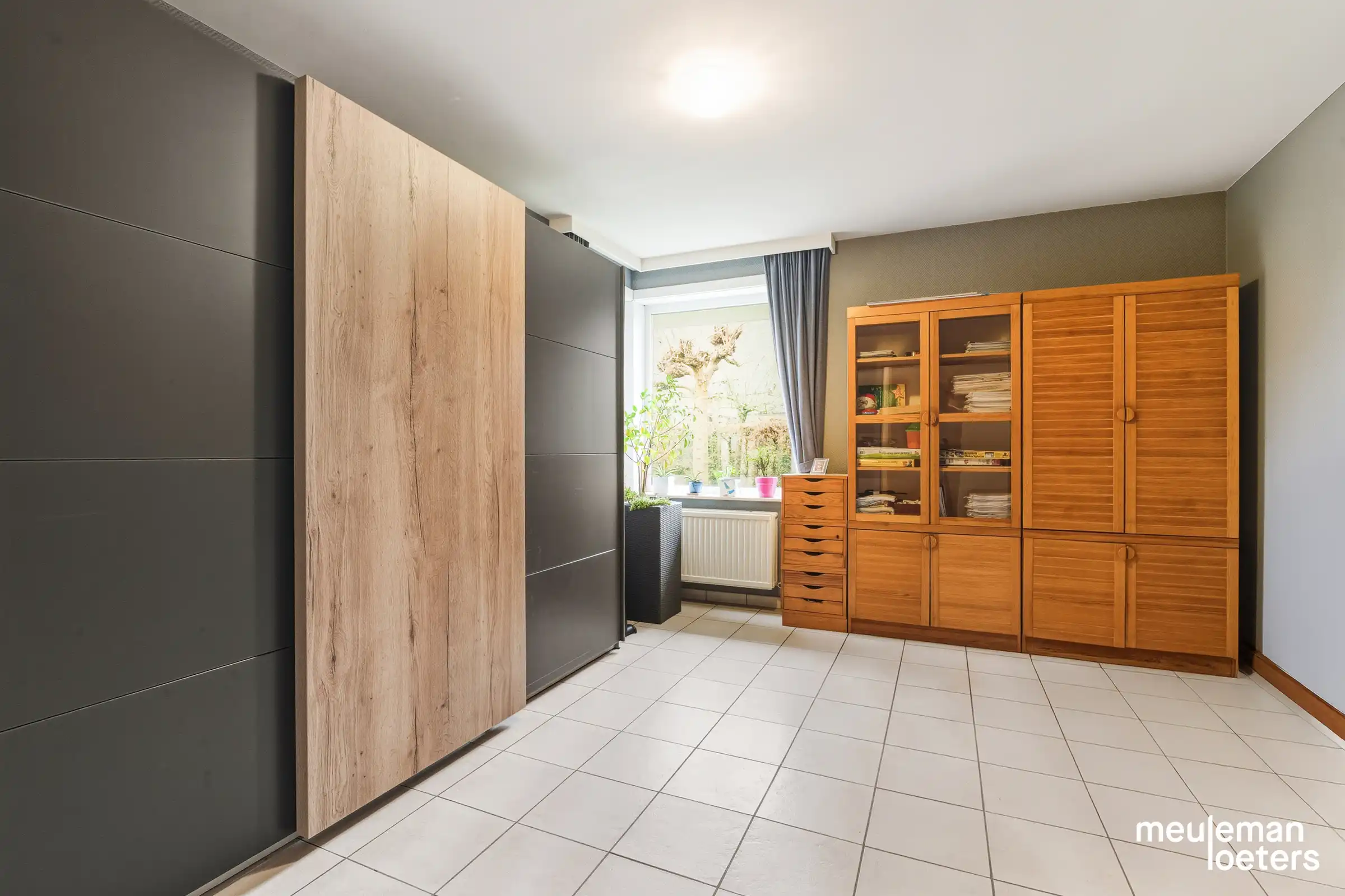 Schitterend gelegen en energiezuinige gelijkvloerse woning met tuin en garage foto 11