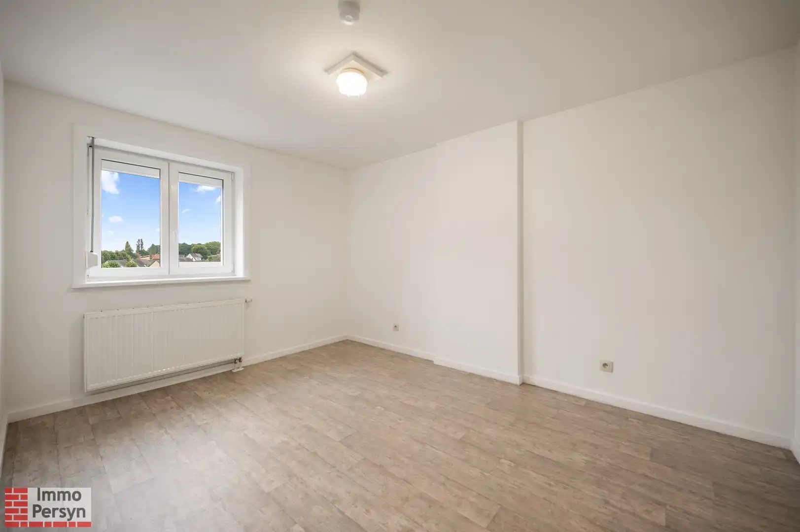 Instapklare rijwoning aan de stadsrand van Diest foto 11