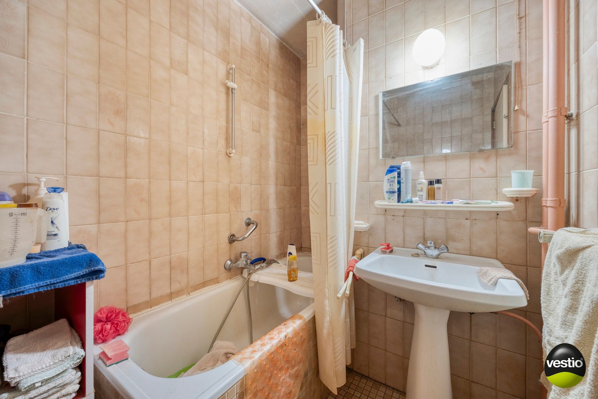 Te renoveren 2-slaapkamerappartement met terras, garagebox en kelder. foto 8