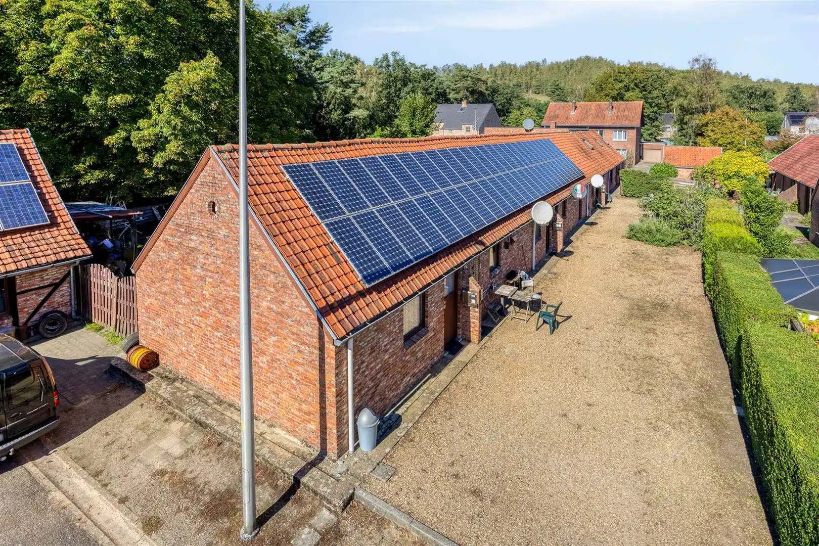TE KOOP: Uniek woon- en investeringspand met ruime woning en 6 verhuurde studio’s te Heusden-Zolder! foto 37