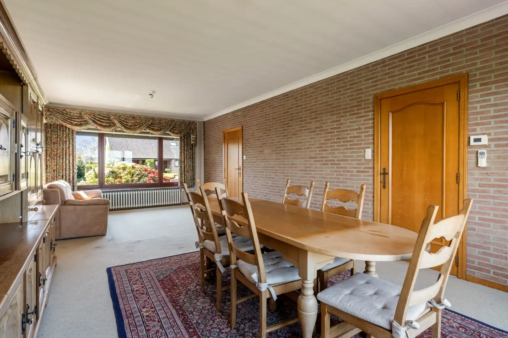 Gelijkvloerse gezinswoning op een ruim perceel van 9a51ca op een rustige locatie met uitzicht op achterliggende weilanden!  foto 10