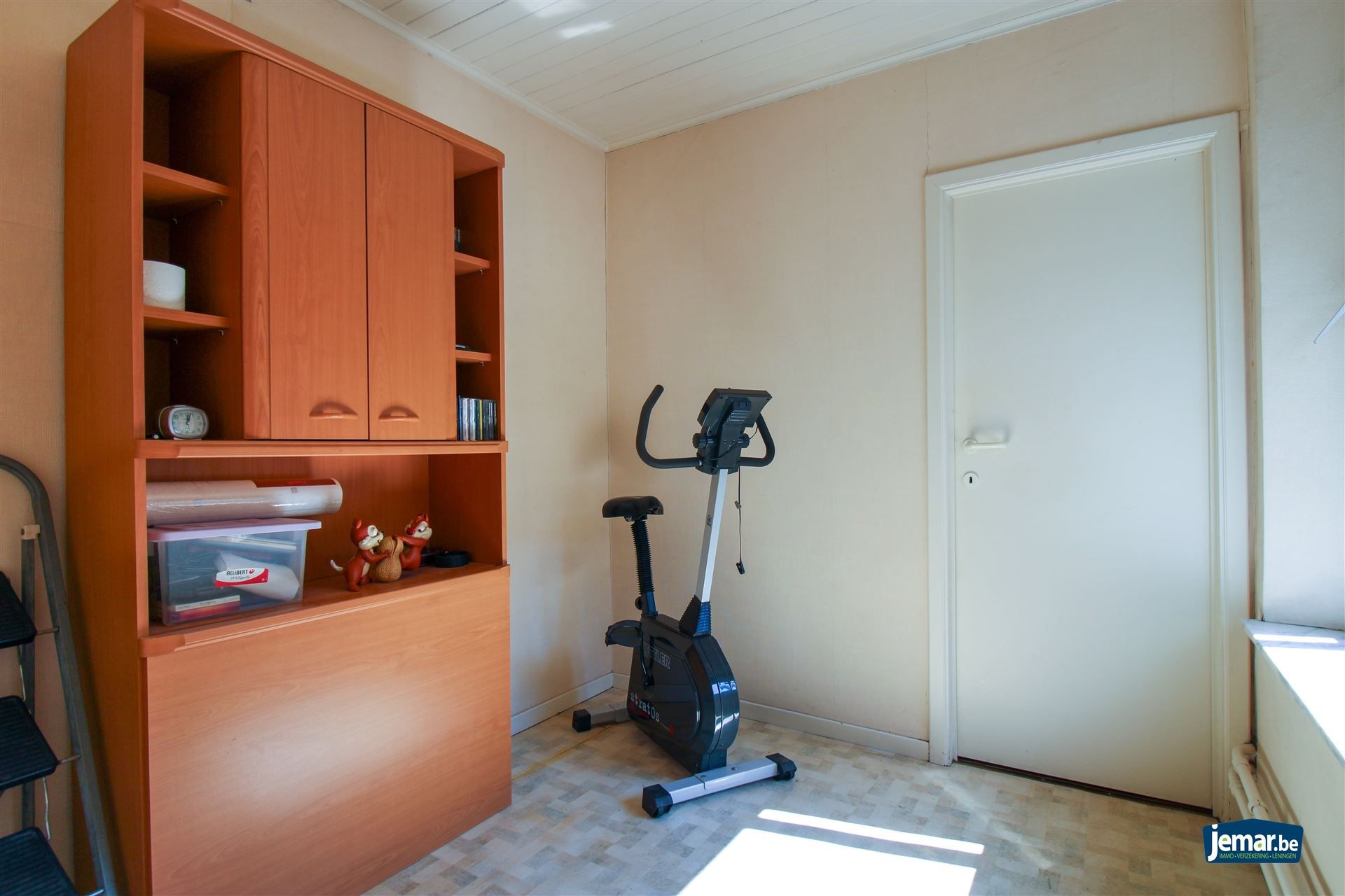 Karaktervol handelspand met woonst op toplocatie – ideaal om wonen en werken te combineren in het hart van Maasmechelen! foto 9