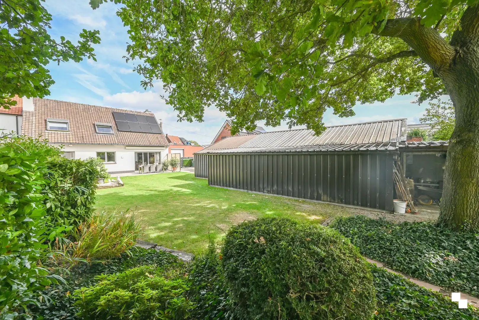 Charmante, goed onderhouden woning met werkplaats foto 2