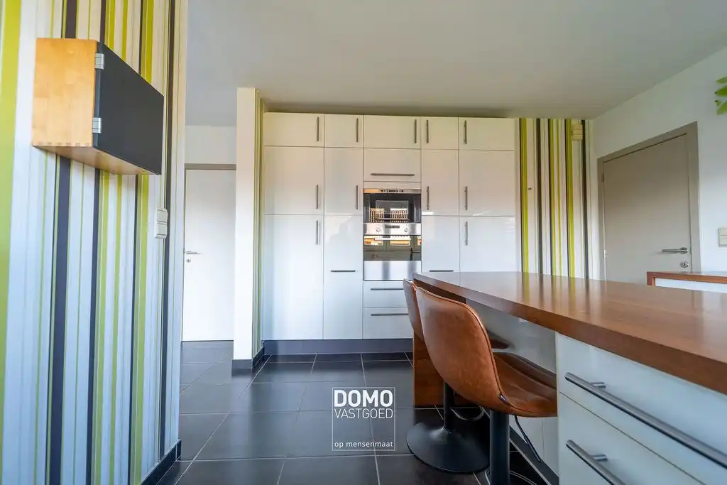 Wonen in alle rust: instapklare open bebouwing met ruime zonnige tuin te Stokrooie foto 9