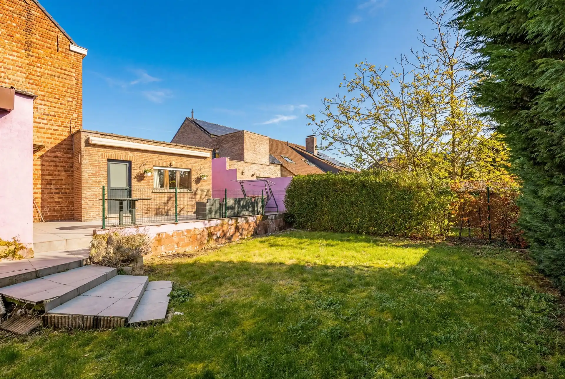 Instapklare woning met 4 slks, garage en aanpalende bouwgrond foto 25