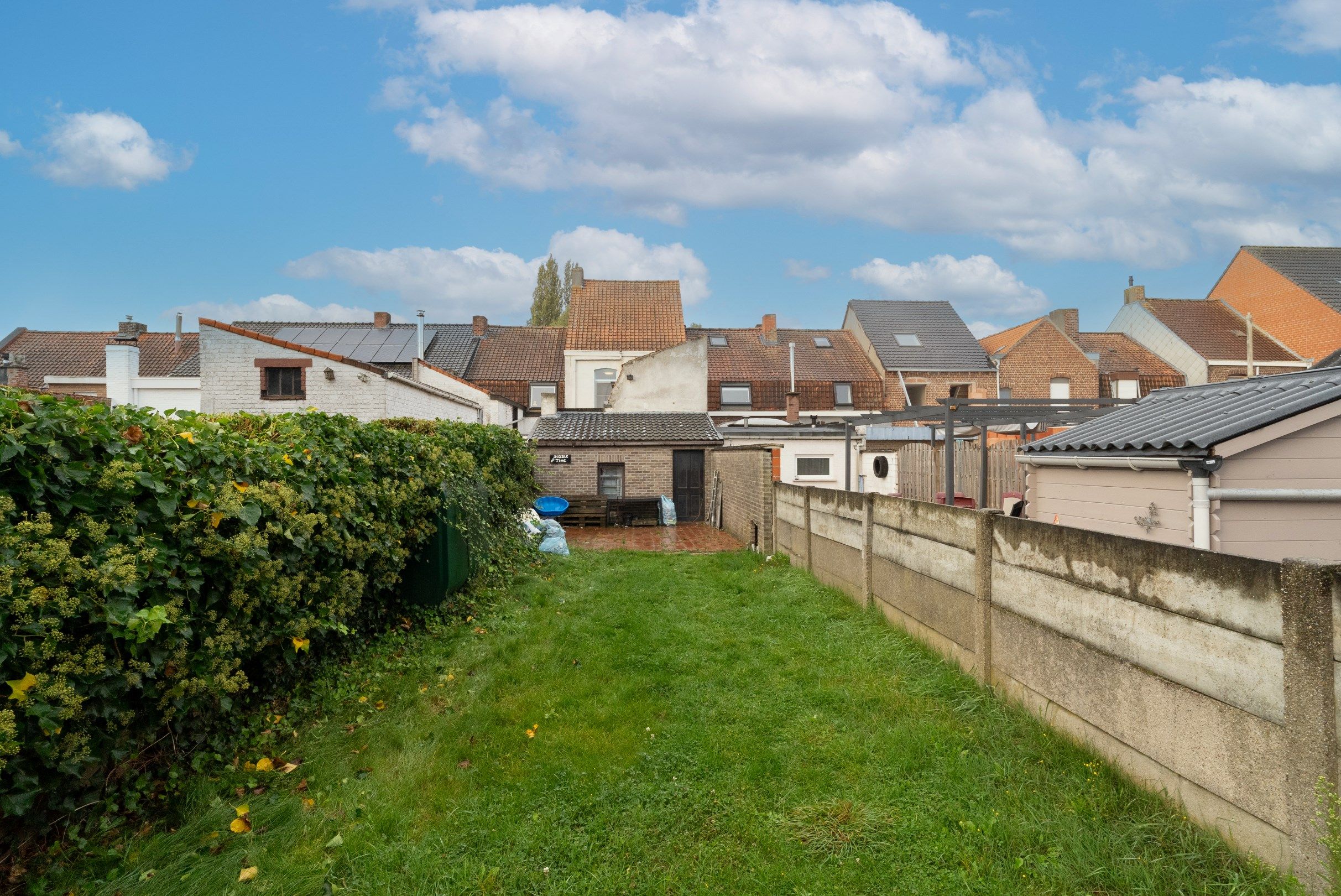Gezinswoning met garagebox en uitweg foto 12