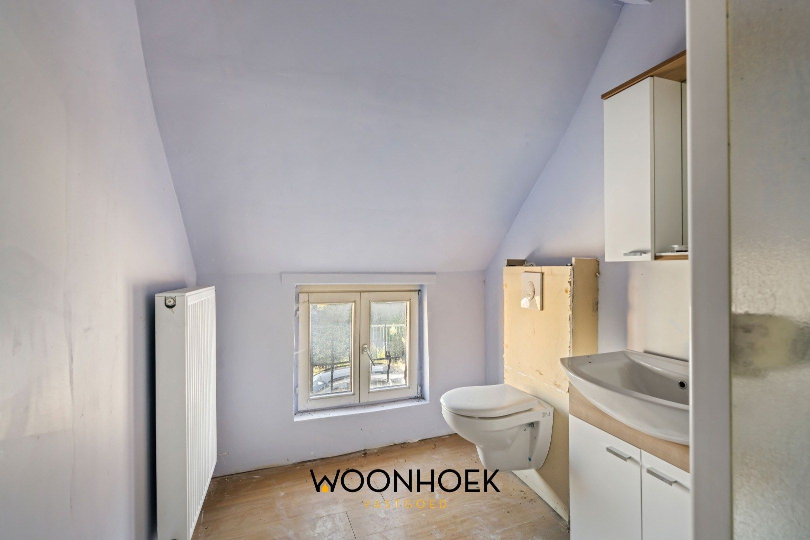 Te renoveren woning in centrum Overmere foto 9