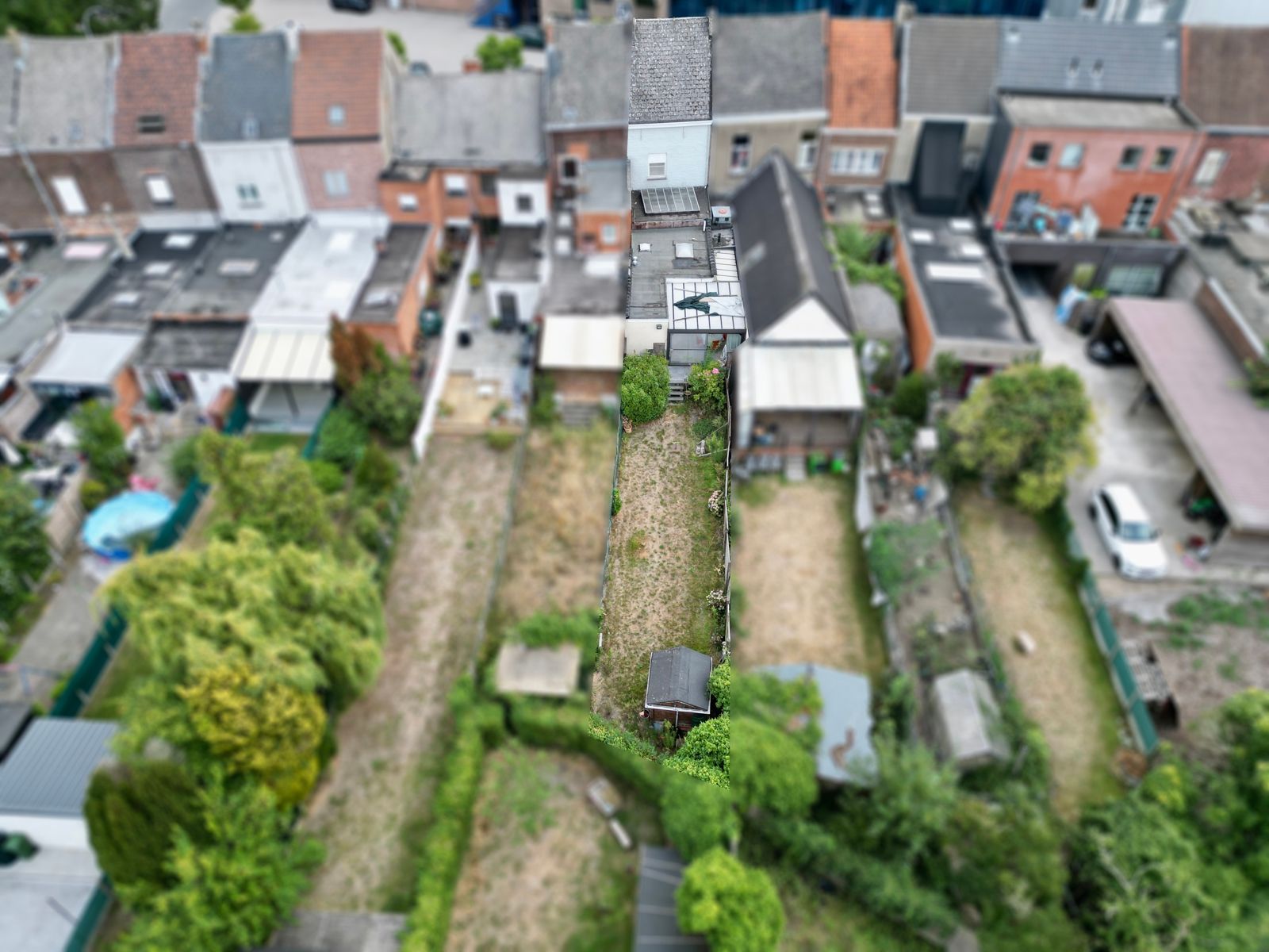 Centraal gelegen rijwoning met 2 SLPK én mooie stadstuin! foto 19
