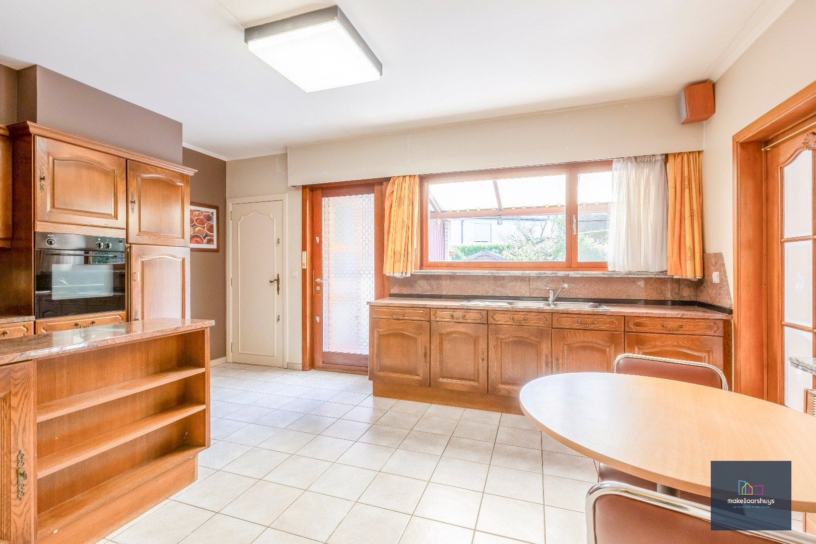 Rustig gelegen ruime bungalow met dubbele garage in Drongen foto 11