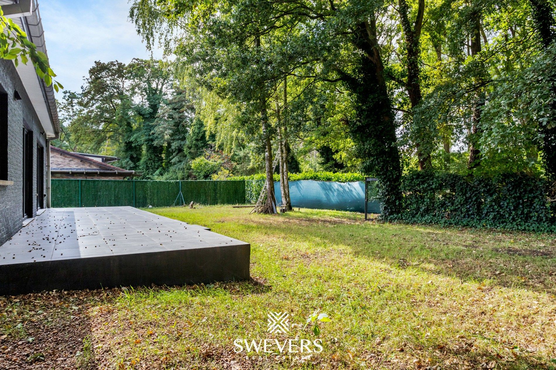 Volledig gerenoveerde gezinswoning met garage en tuin te Genk foto 28