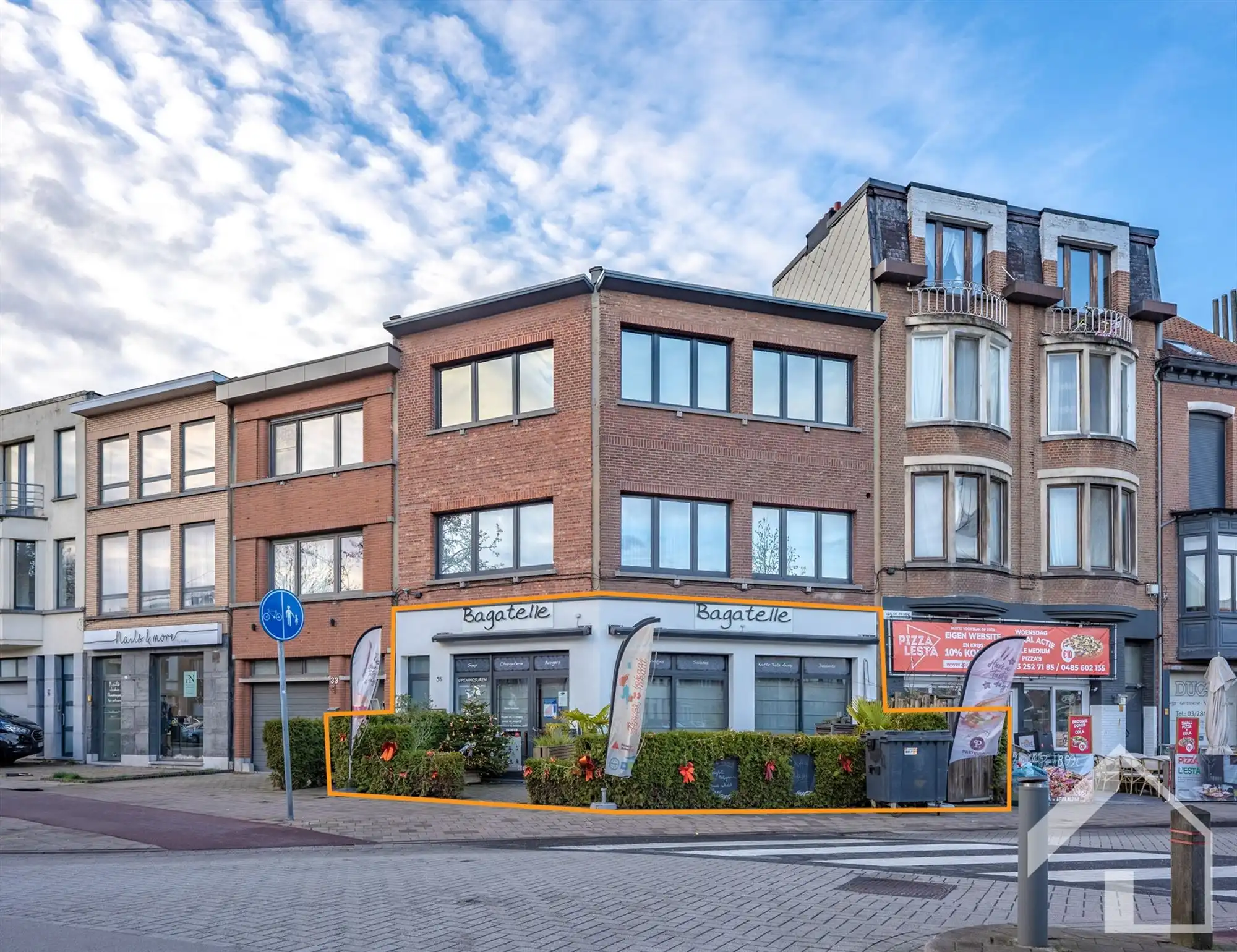 Gelijkvloers handelspand met 2 appartementen foto 2