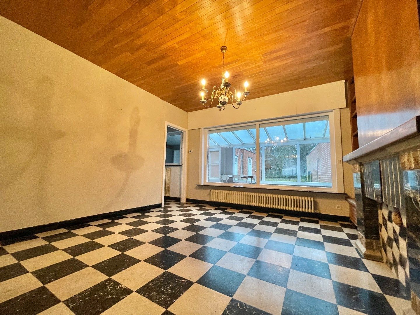 Grote woning met mogelijks 5 kamers, garage en zongerichte tuin foto 4