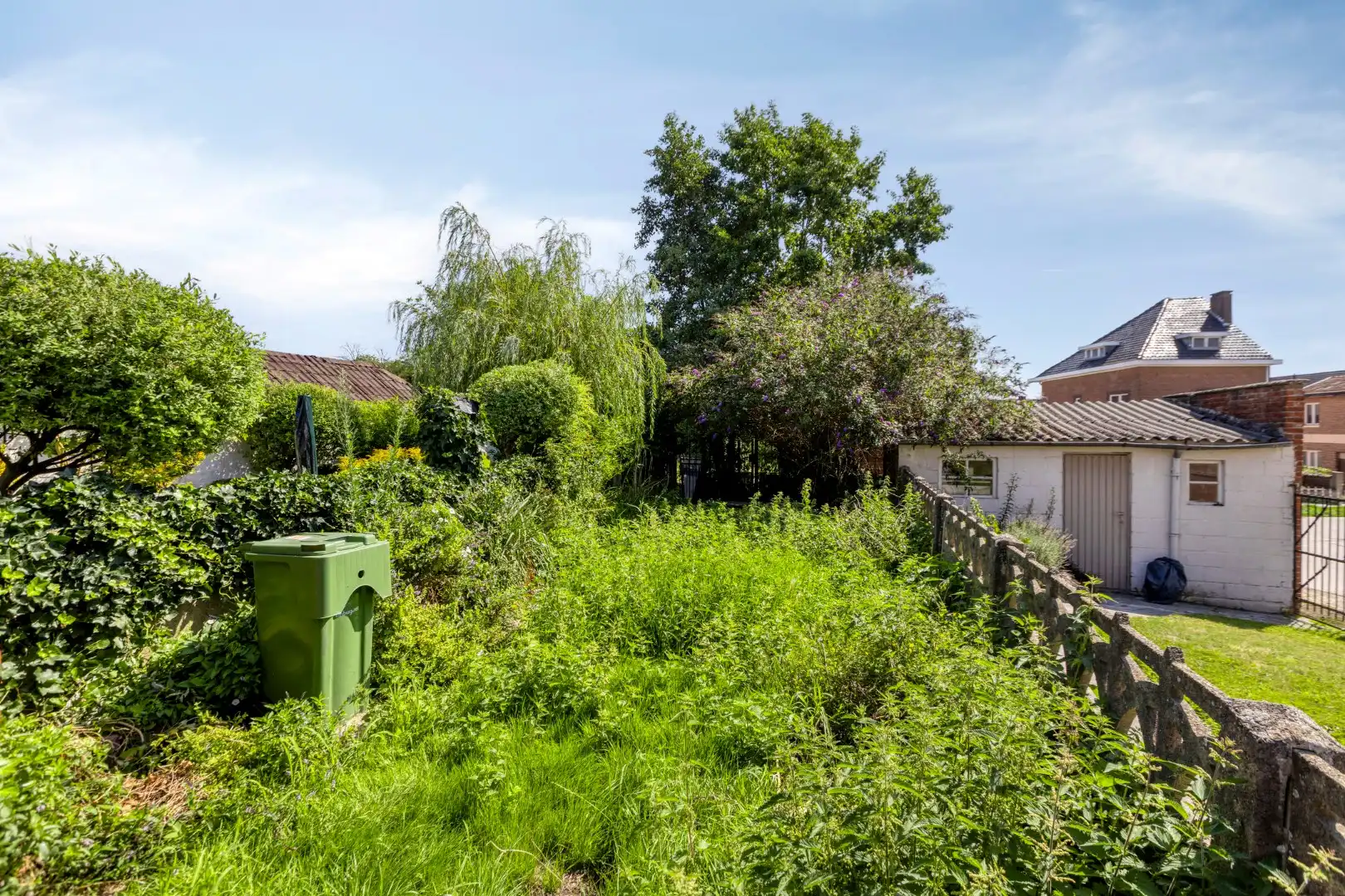 Gezellig ingerichte woning met hobbyruimte en tuin + toegang achterom foto 28