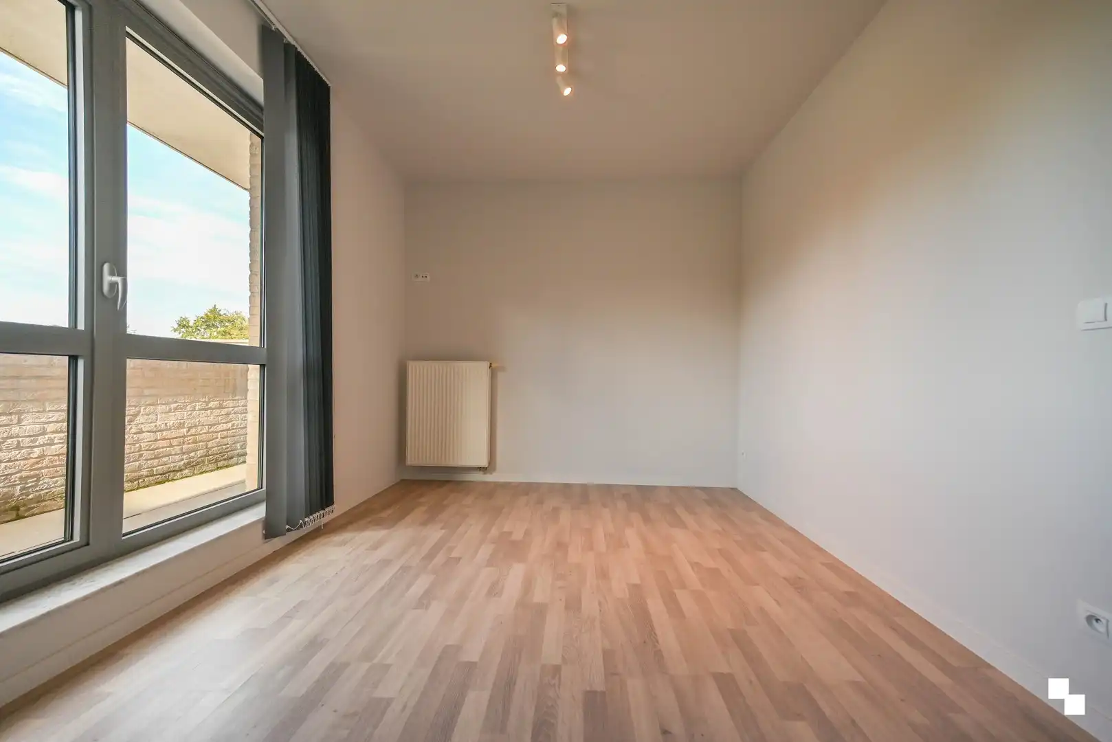 Ruim appartement met drie slaapkamers & garagebox foto 18