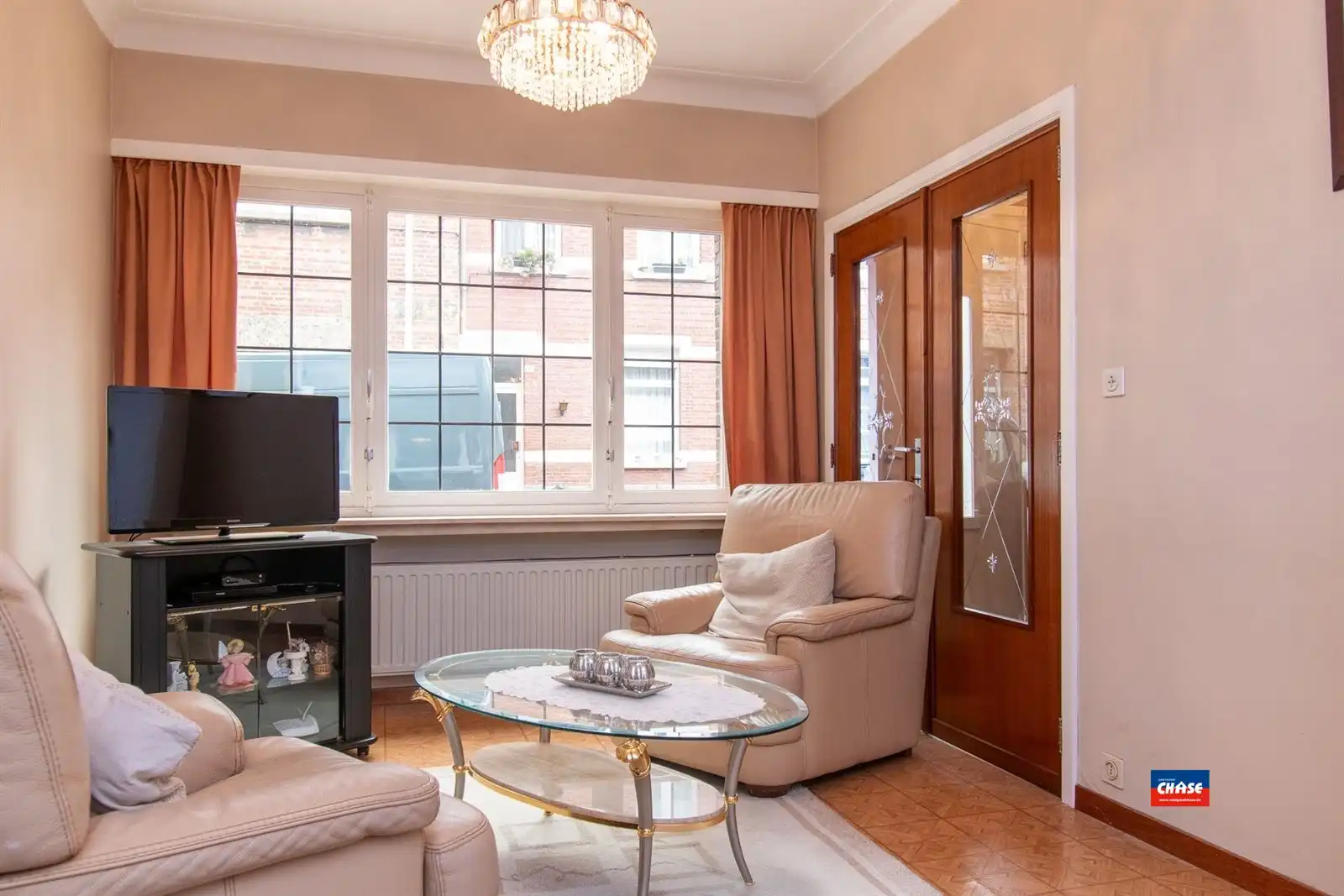Charmante (op te frissen) rijwoning met 3 à 4 slaapkamers en prachtige tuin foto 7