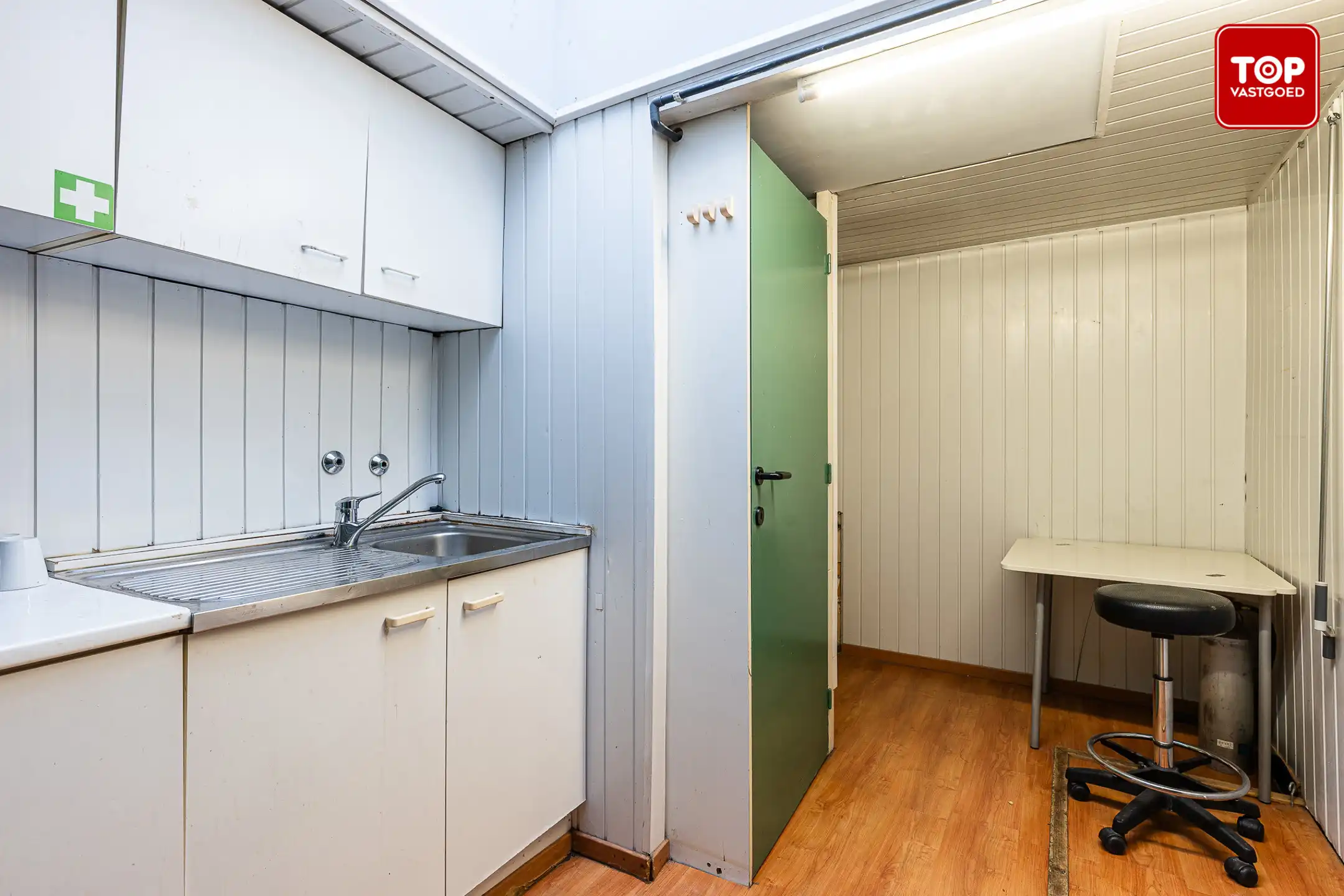 Woning met handelsgelijkvloers op een commercieel interessante ligging.  foto 9