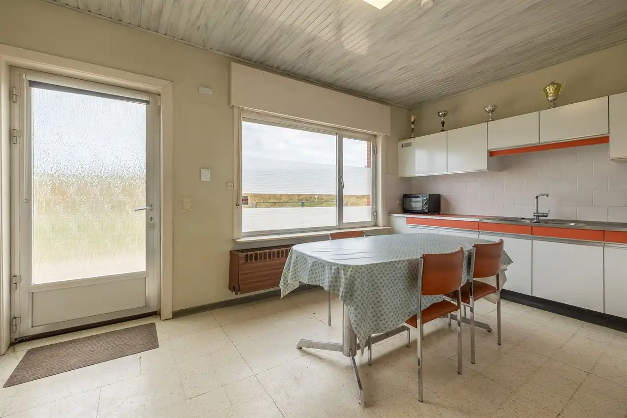Gelijkvloerse woonst, 3 slpk, op 29a 53ca foto 6