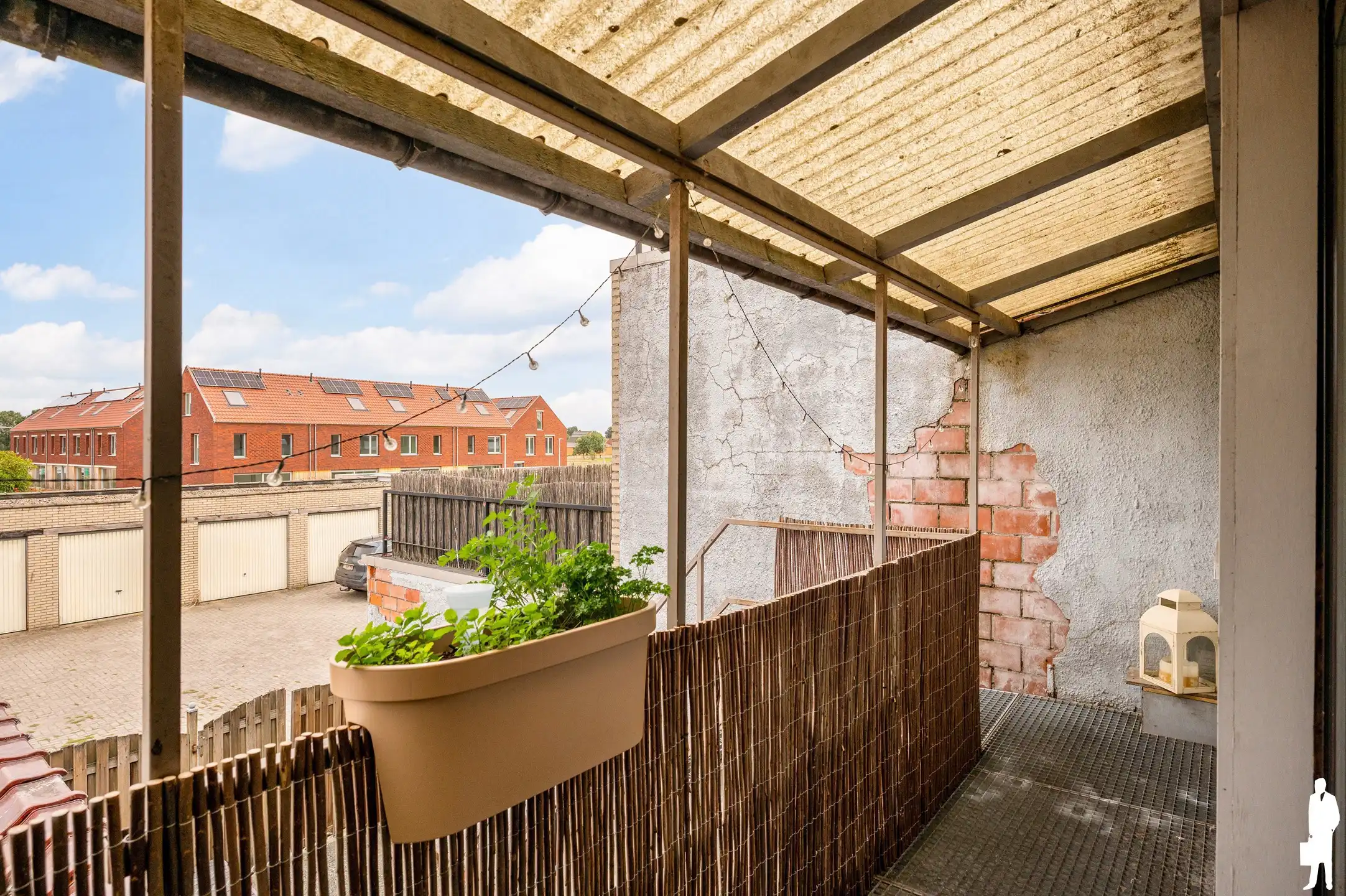 Handelspand met duplex appartement, terras en 2 garageboxen in centrum Nieuwmoer foto 24