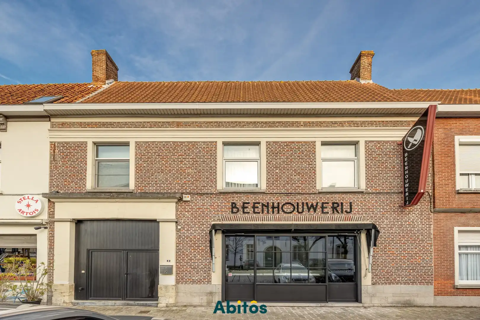 Handelspand op absolute topligging in het centrum van Drongen foto {{pictureIndex}}