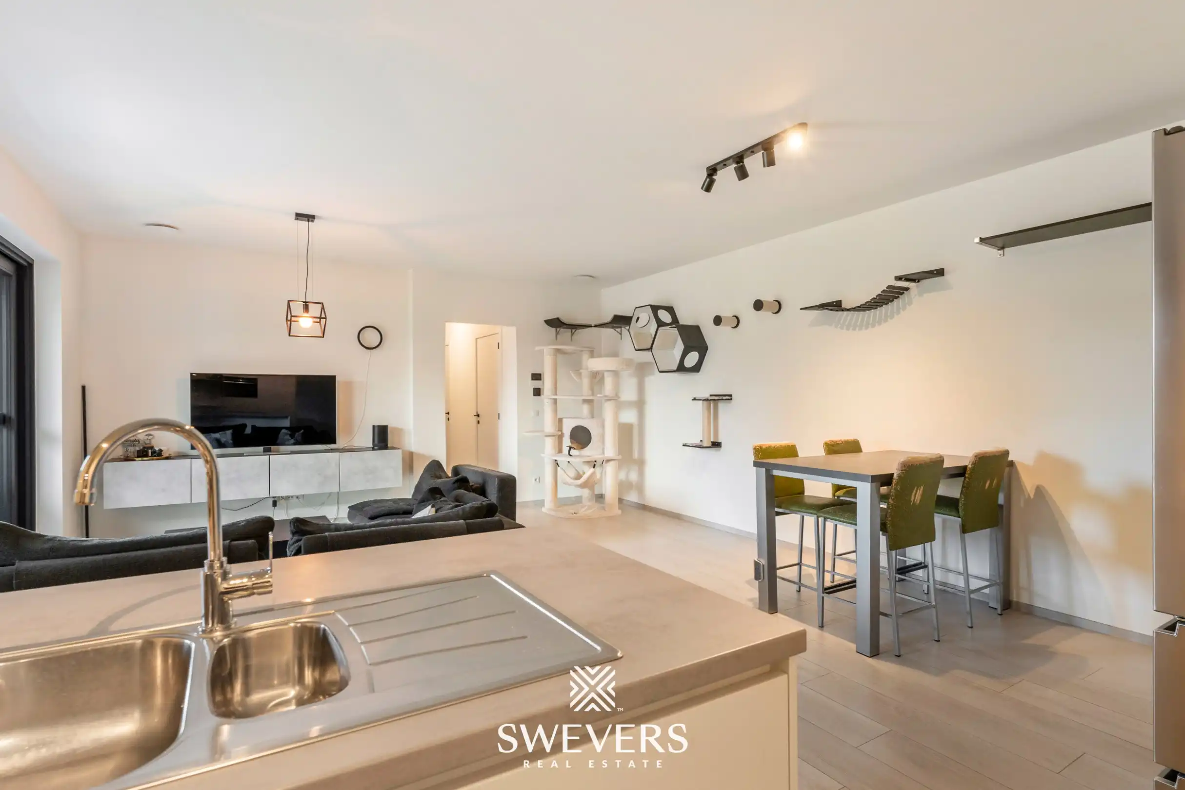 Instapklaar, energiezuinig gelijkvloers appartement (99 m²) met garage en kelders in het pittoreske Bolderberg foto 12