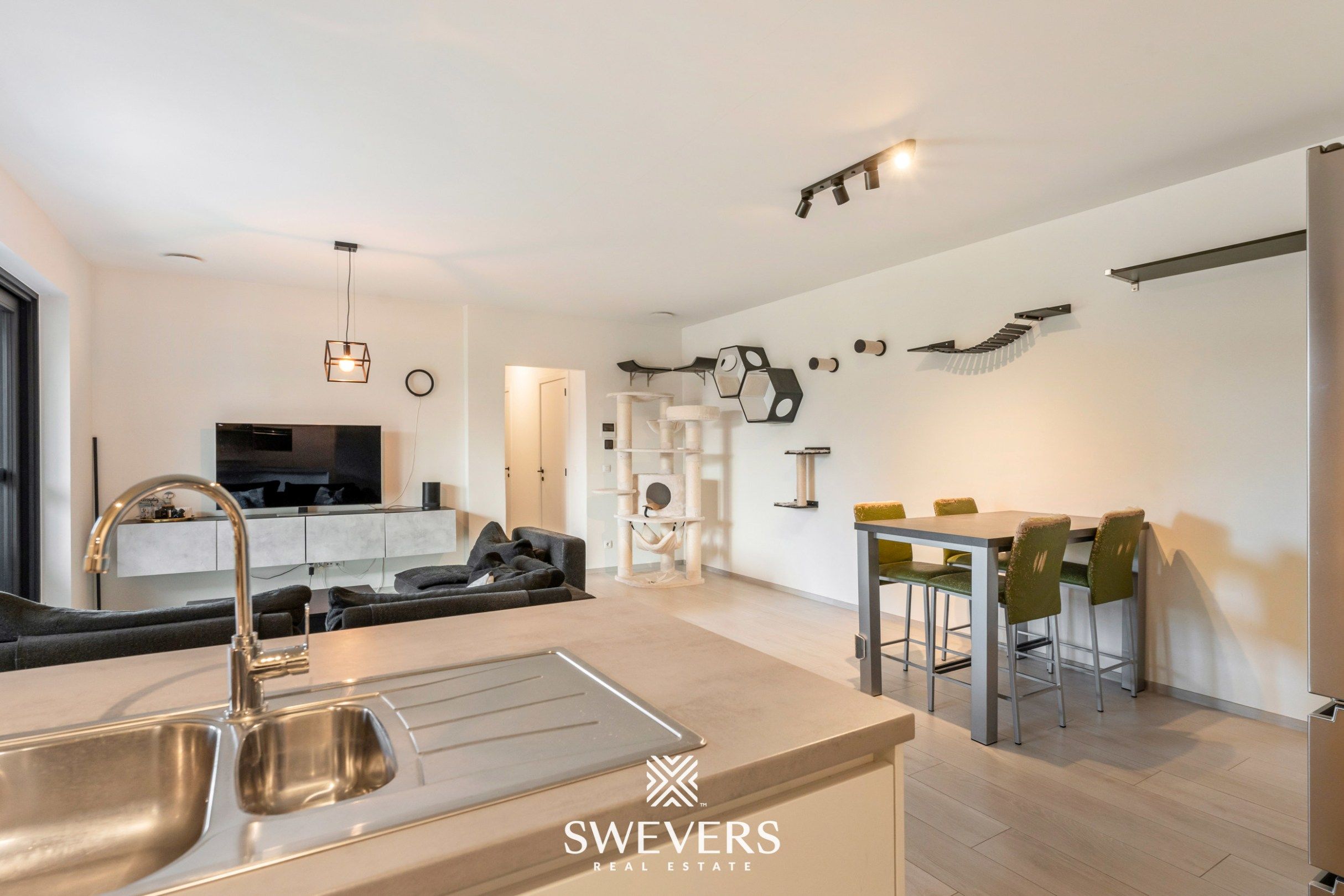 Instapklaar, energiezuinig gelijkvloers appartement (99 m²) met garage en kelders in het pittoreske Bolderberg foto 12