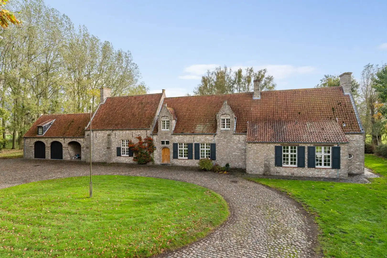 Exclusief landhuis “Reigershof” met bijgebouw en uniek domein te Damme foto 5