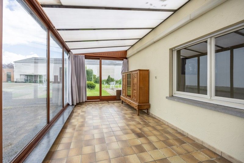 Woning, open bebouwing met naastliggende, grote loods op 18are foto 19