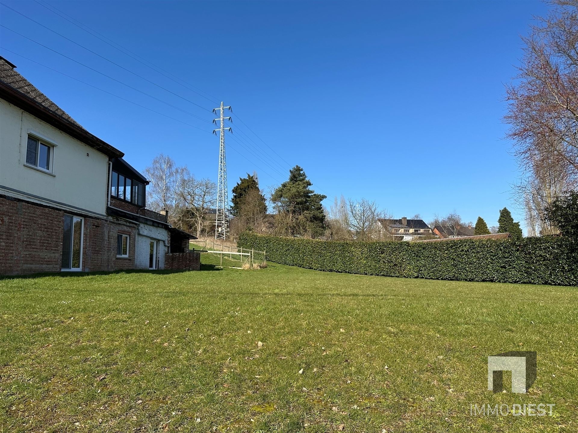 Unieke woning met praktijk en bouwgrond op zichtlocatie foto 7