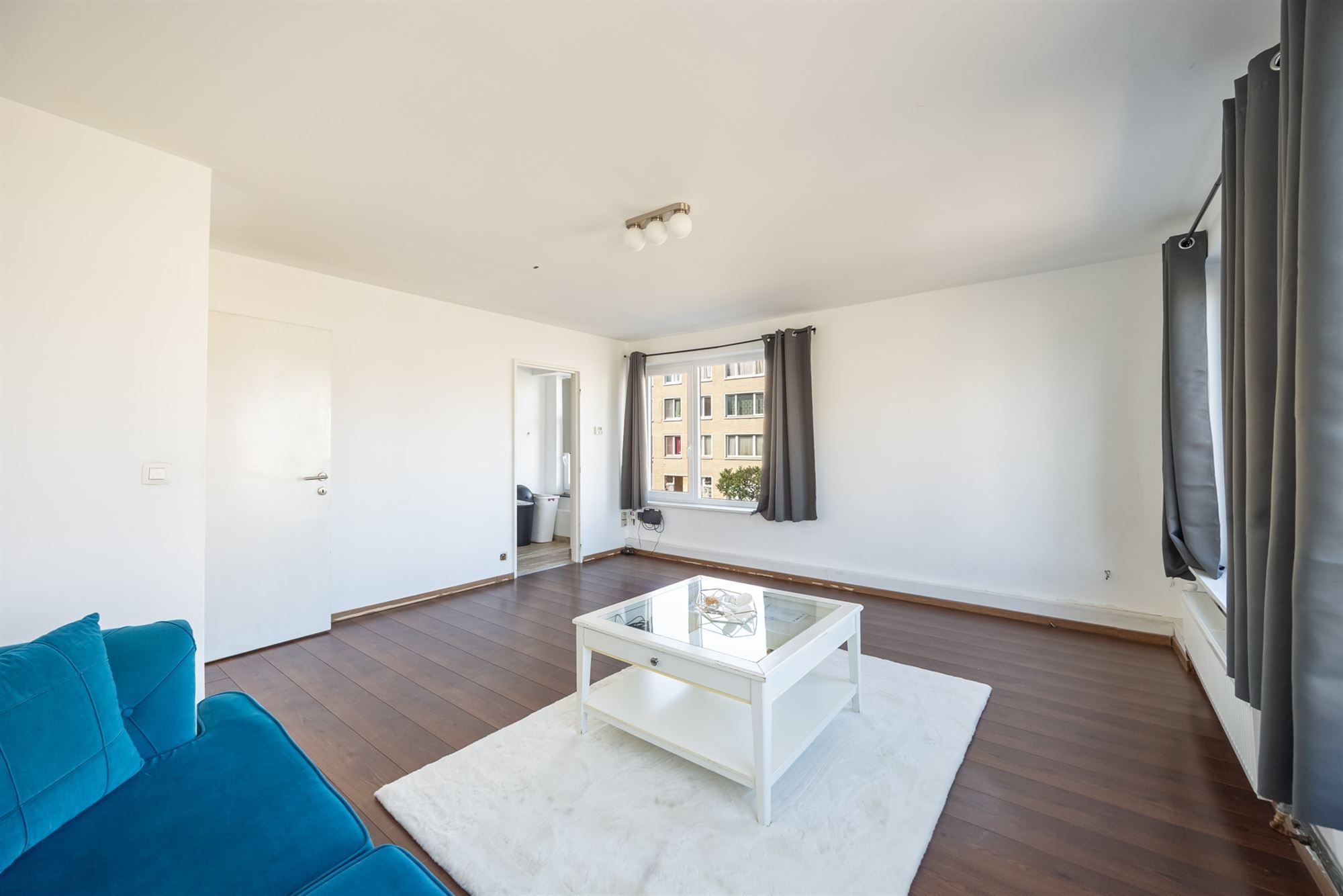 Lichtrijk hoekappartement met 1 slaapkamer foto 11