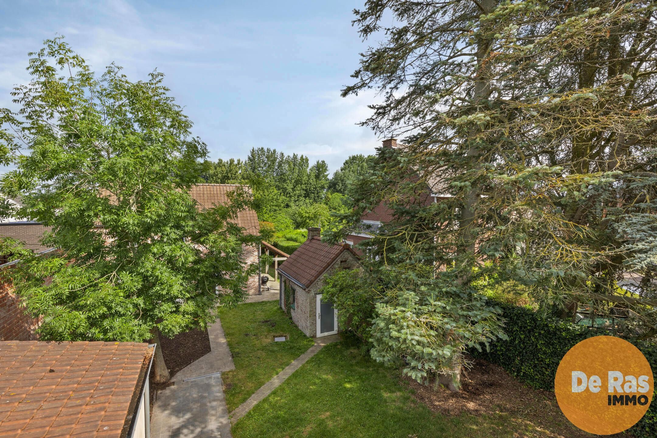 BURST - Instapklare woning met bijgebouw en ruime tuin foto 27