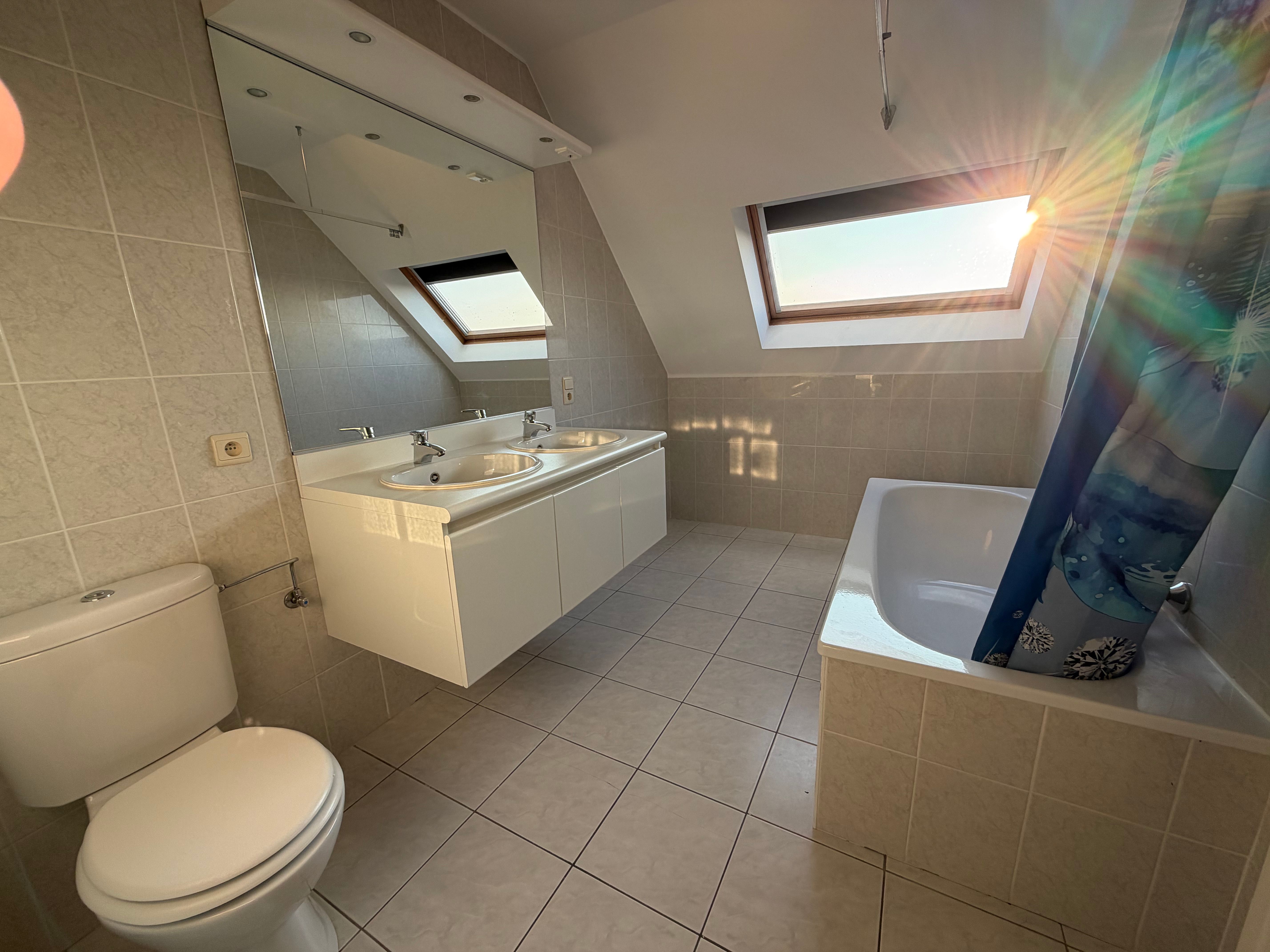 Mooi duplexappartement met drie slaapkamers en twee zongerichte terrassen. foto 28