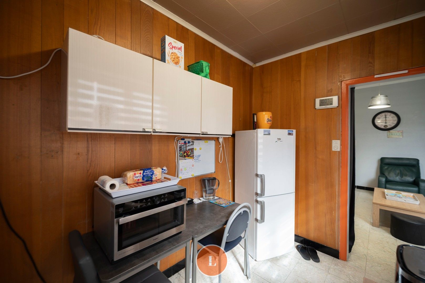 Te renoveren woning te koop in centrum Menen foto 5