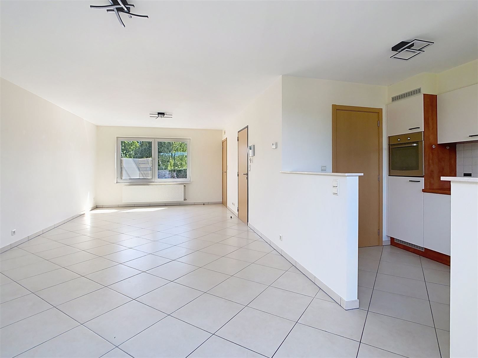Ruim duplex app met terras, 3 slpks, parkeerplaats foto 9