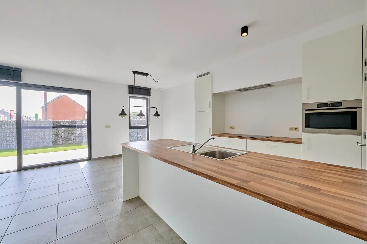 Stijlvol gelijkvloers appartement met zongerichte tuin - EPC11! foto 4