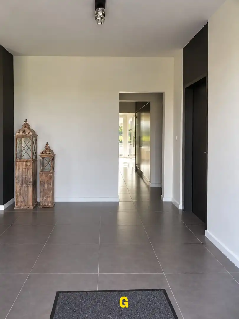 Aantrekkelijk gerenoveerde woning in OB met drie slaapkamers, terras, garage en tuin  foto 4
