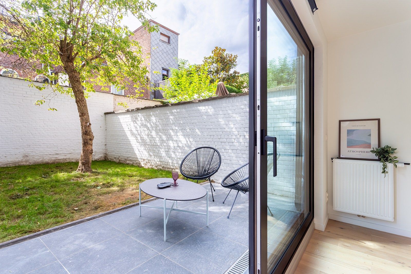 Prachtige duplex met tuin en garage foto {{pictureIndex}}