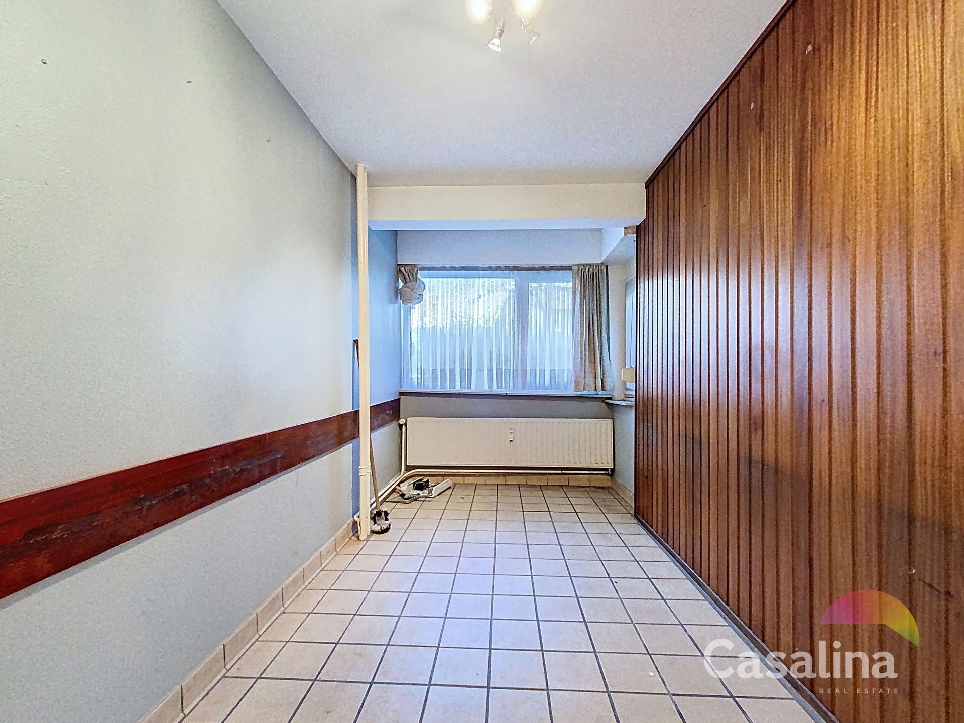 Een gelijkvloerse kantoor, te renoveren van ± 34 m² foto 2