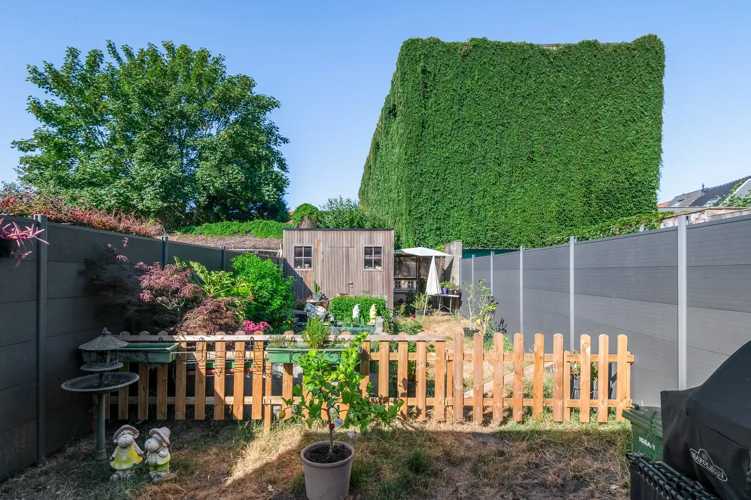 Instapklare woning met 4 slaapkamers, garage en tuin te Niel foto 16